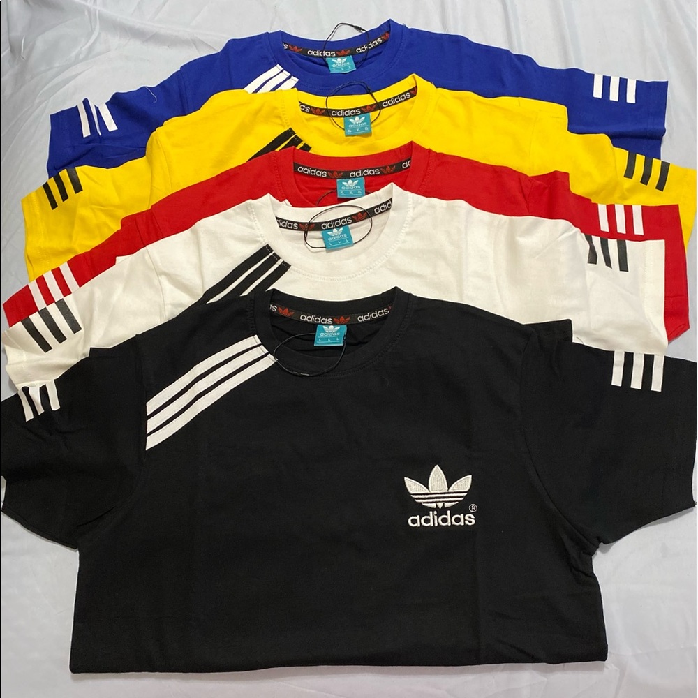 ALL SIZES RARE UNISEX ADIDAS..CHAMPION AND PUMA SHIRTS $30 APIECE 4 FOR $100